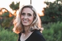 Diana Reyes — hair regrowth therapy client at Hera Wellness Studio with visible new hair growth